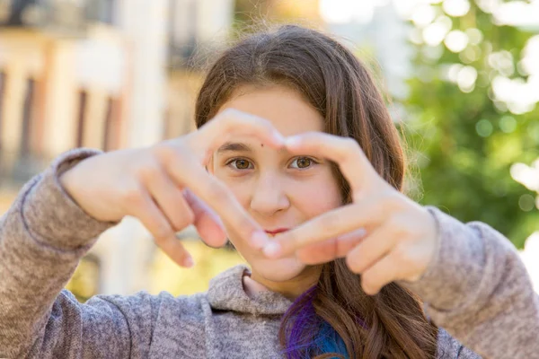 Teenager Girl Looking Fingers Hands Folded Heart Symbol — Stockfoto