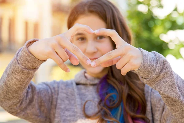 Beautiful Attractive Girl Making Heart Symbol Her Hands Blurred Face — Stockfoto