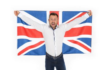 İngiliz bayrağını gururla taşıyan iş adamı vatansever. Kotlu ve gömlekli mutlu yakışıklı adam İngiltere bayrağı sallıyor. Büyük Britanya 'nın destekçisi.