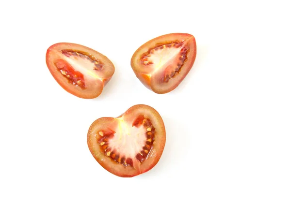 Tomatenhelften Plakjes Een Lichtwitte Achtergrond Kumato Donkere Tomatenvariëteit — Stockfoto