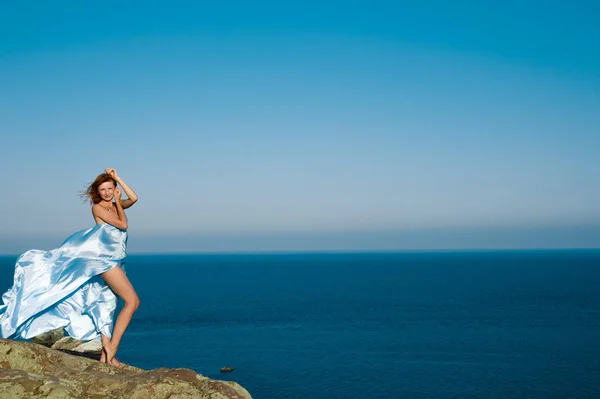 Red Haired Girl Blue Dress Flying Sky Sea — Stock Photo, Image