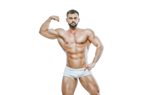 Bodybuilder poseren. Mooie sportieve man mannelijke kracht. Fitness mus — Stockfoto
