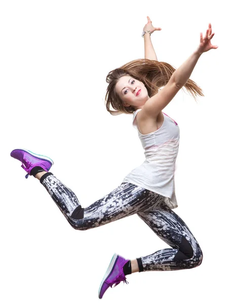 Bela menina atlética dançando salto fundo branco — Fotografia de Stock