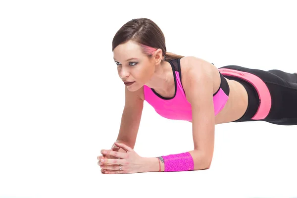 One woman exercising workout fitness aerobic exercise on studio isolated white background. Perfect plank. — Stock Photo, Image