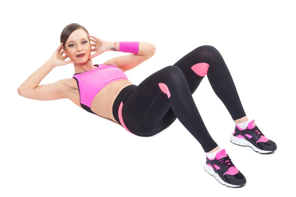 Een vrouw uitoefening workout fitness aërobe oefening abdominale push ups houding op studio geïsoleerd witte achtergrond. — Stockfoto