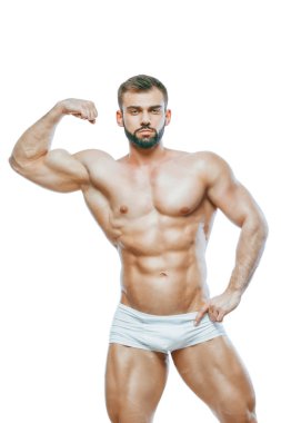 vücut geliştirmeci poz. Güzel sportif adam erkek güç. Fitness mus