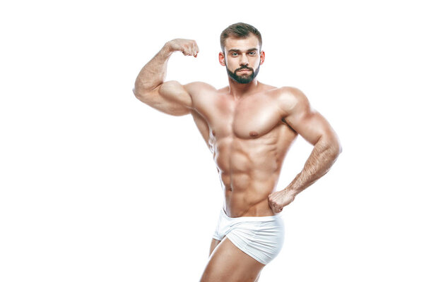 Bodybuilder posing. Beautiful sporty guy male power. Fitness muscled manin white lingerie. on isolated white background