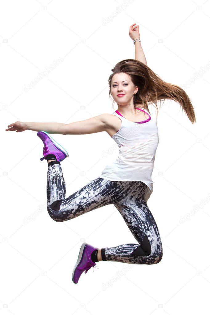 beautiful athletic girl dancing jumping White background