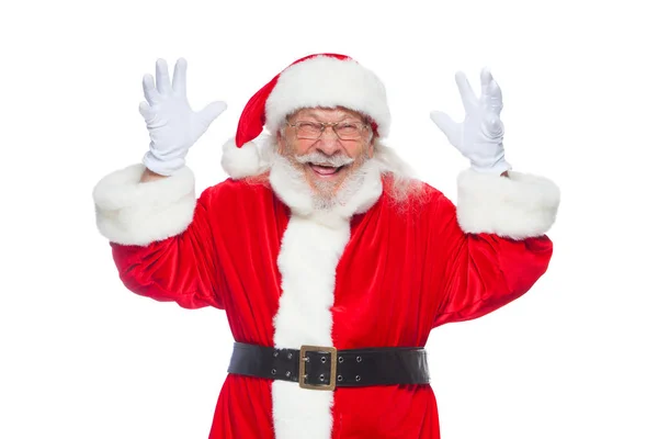 Navidad. El buen Papá Noel con guantes blancos muestra caras, muecas, muestra su lengua. No es un comportamiento normal. Aislado sobre fondo blanco . — Foto de Stock