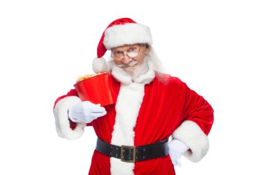 Noel. Gülümsüyor, bir Noel Baba beyaz eldiven kırmızı bir kova patlamış mısır tek elle ile tutar ve onun kemer diğer el koyar. Tarassut a film ile sinema, ziyaret kavramı