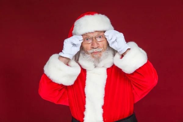 Christmas Serious Santa Claus White Gloves Adjusts Her Glasses Stares — Stock Photo, Image