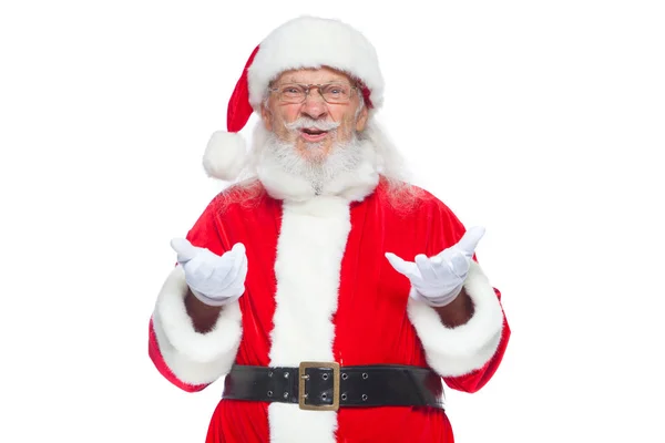 Рождество. Хороший Санта Клаус в белых перчатках показывает лица, гримасы, показывает свой язык. Нестандартное поведение. Изолированный на белом фоне . — стоковое фото