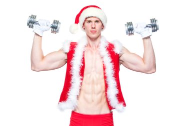 Tatiller ve kutlamalar, yeni yıl, yılbaşı, spor, vücut geliştirme, sağlıklı yaşam - kas yakışıklı Noel Baba. beyaz bir arka plan üzerinde dumbbells ile. Beyaz arka plan üzerinde izole.