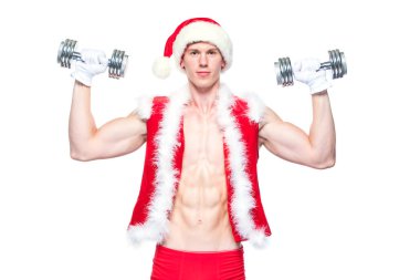 Tatiller ve kutlamalar, yeni yıl, yılbaşı, spor, vücut geliştirme, sağlıklı yaşam - kas yakışıklı Noel Baba. beyaz bir arka plan üzerinde dumbbells ile. Beyaz arka plan üzerinde izole.