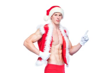 Seksi Noel Baba beyaz boş oturum açma işaret. Genç kaslı adam giyen Santa Claus şapka kasları göstermektedir. Beyaz arka plan üzerinde izole.