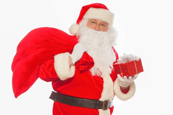 Santa Claus: Vrolijk met kleine Stack van geschenken grote zak, isoleren — Stockfoto
