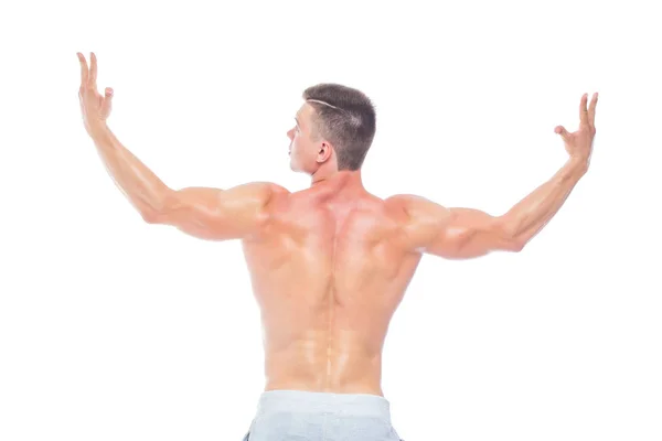Potente espalda. Strong Athletic Man Modelo Fitness que muestra su cuerpo perfecto aislado sobre fondo blanco con copyspace. Culturista con abdominales, hombros, bíceps, tríceps y pecho perfectos . — Foto de Stock