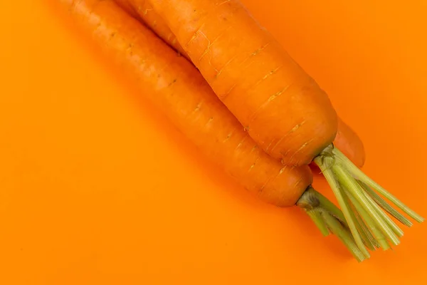 Морква Помаранчевому Тлі — стокове фото