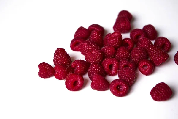Raspberry on a white background, close-up red — Stock Photo, Image