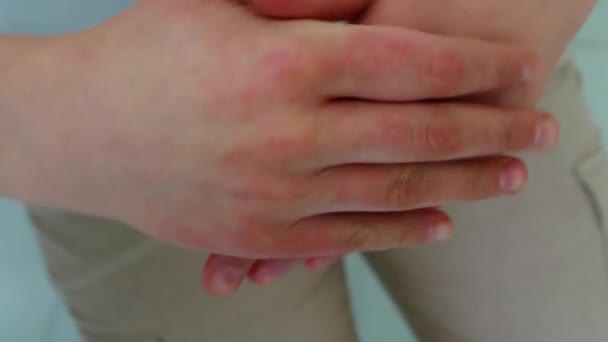 Closeup of female hands applying hand cream — Stock Video