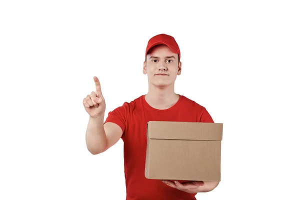 The guy in a special uniform in red and a cap is knocking on the door — Stock Photo, Image