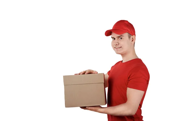 Entrega de mercadorias de um cara mally do serviço de entrega. Uniforme vermelho . — Fotografia de Stock