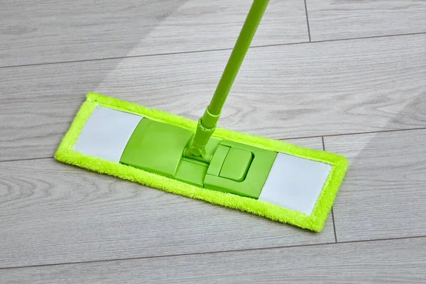 After cleaning, a light, clean track remains. Wash the floor with a mop.