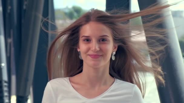 Time-lapse shot of blond hair developing in the wind. Blonde girl. — Stock Video