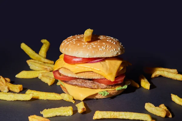 Big double Burger with fries. Not a healthy food with a high calorie content. — Stock Photo, Image