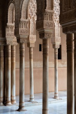 Moorish arches in the Court of the Lions in The Alhambra, Granada, Spain clipart
