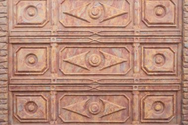 Dekoratif kahverengi desenli çit fayansları. Seramik panel, dekor