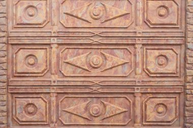 Dekoratif kahverengi desenli çit fayansları. Seramik panel, dekor