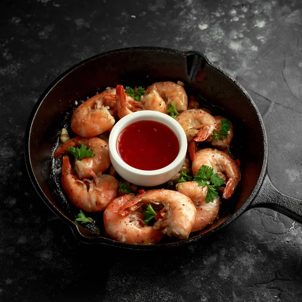 Fried in garlic butter shrimps served with sweet chili suace and parsley
