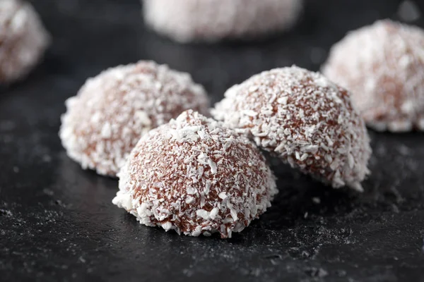 Sweet mallow snowballs with chocolate coating and coconut — Stock Photo, Image