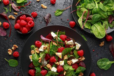 Healthy Beet Salad with raspberry, walnuts nuts and feta cheese