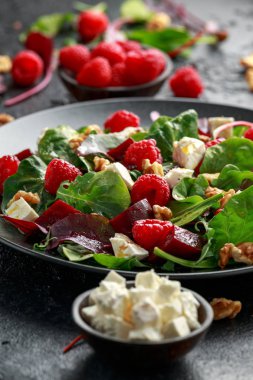 Healthy Beet Salad with raspberry, walnuts nuts and feta cheese