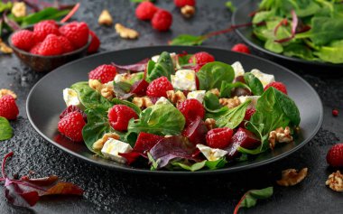 Healthy Beet Salad with raspberry, walnuts nuts and feta cheese