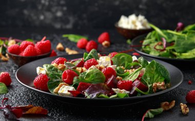 Healthy Beet Salad with raspberry, walnuts nuts and feta cheese