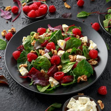 Healthy Beet Salad with raspberry, walnuts nuts and feta cheese