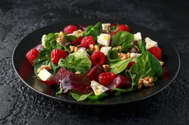 Healthy Beet Salad with raspberry, walnuts nuts and feta cheese