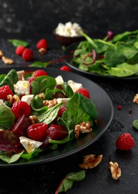 Healthy Beet Salad with raspberry, walnuts nuts and feta cheese