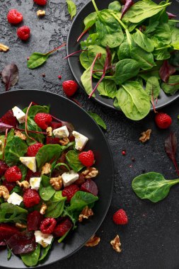Healthy Beet Salad with raspberry, walnuts nuts and feta cheese