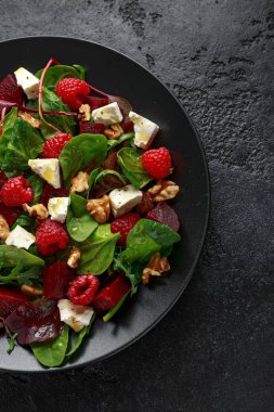 Healthy Beet Salad with raspberry, walnuts nuts and feta cheese