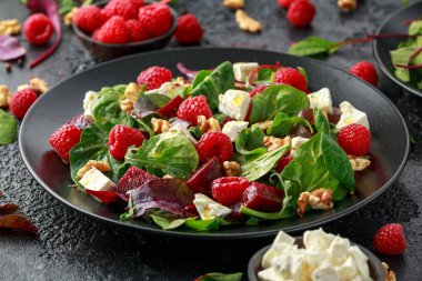 Healthy Beet Salad with raspberry, walnuts nuts and feta cheese