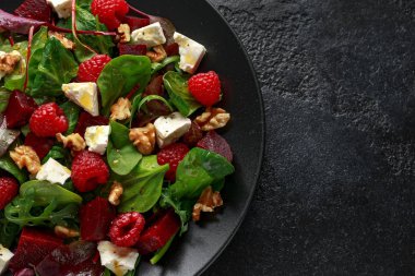 Healthy Beet Salad with raspberry, walnuts nuts and feta cheese