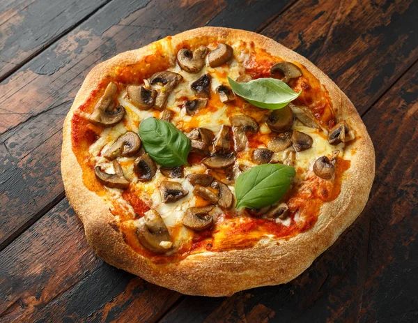 Hot Mushroom Pizza on wooden table. ready to eat. vegetarian food