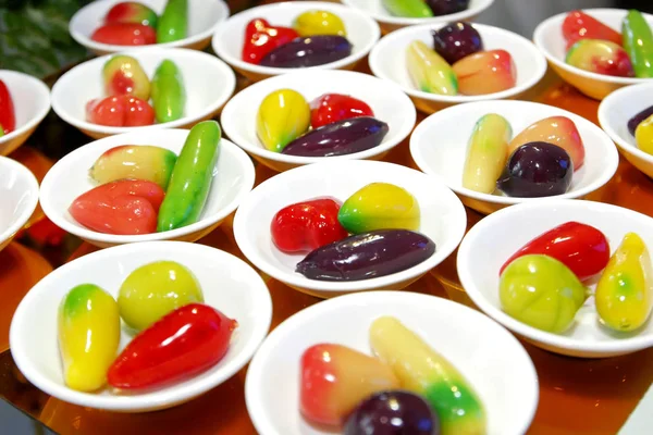 Deletable imitation fruits in small dish on buffet line — Stock Photo, Image