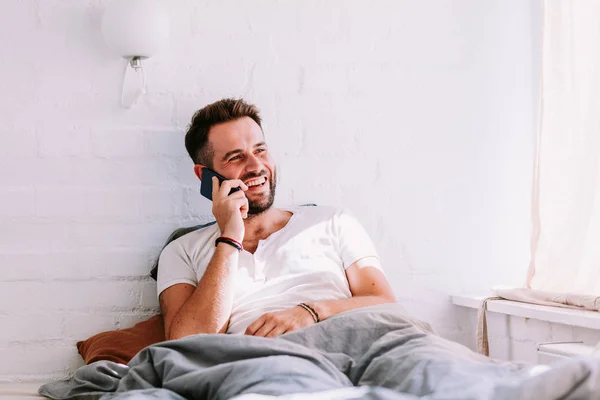 Young Man Using Smartphone Bed Morning — Stock Photo, Image