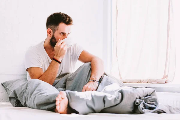 Young Man Drinking Coffee Bed — Stock Photo, Image