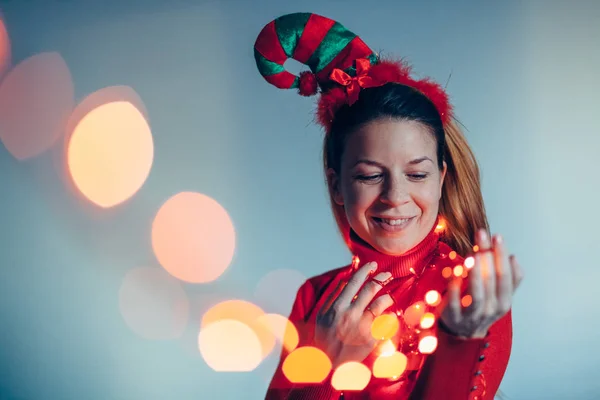 Portrait Woman Wearing Christmas Costume Holding Lights Stock Photo